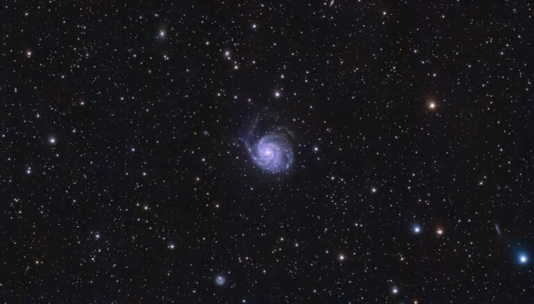 Spiral galaxy surrounded by stars in deep space